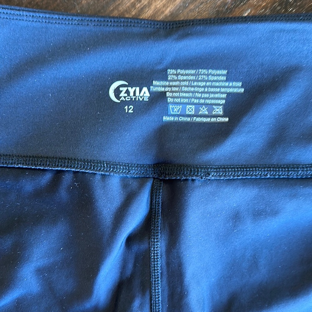 Zyia size 12 legging, hits below knee.